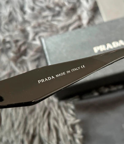 LENTES DE SOL PRADA